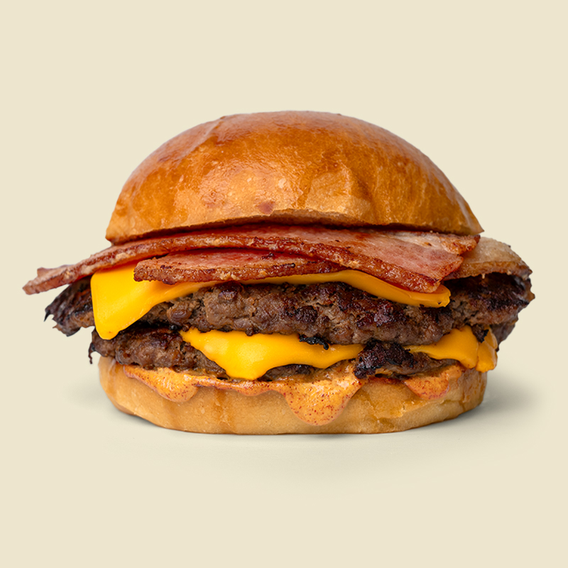 Artisan burger bun, 4 oz 100% chuck roast patty, american cheese, house special sauce and bacon.